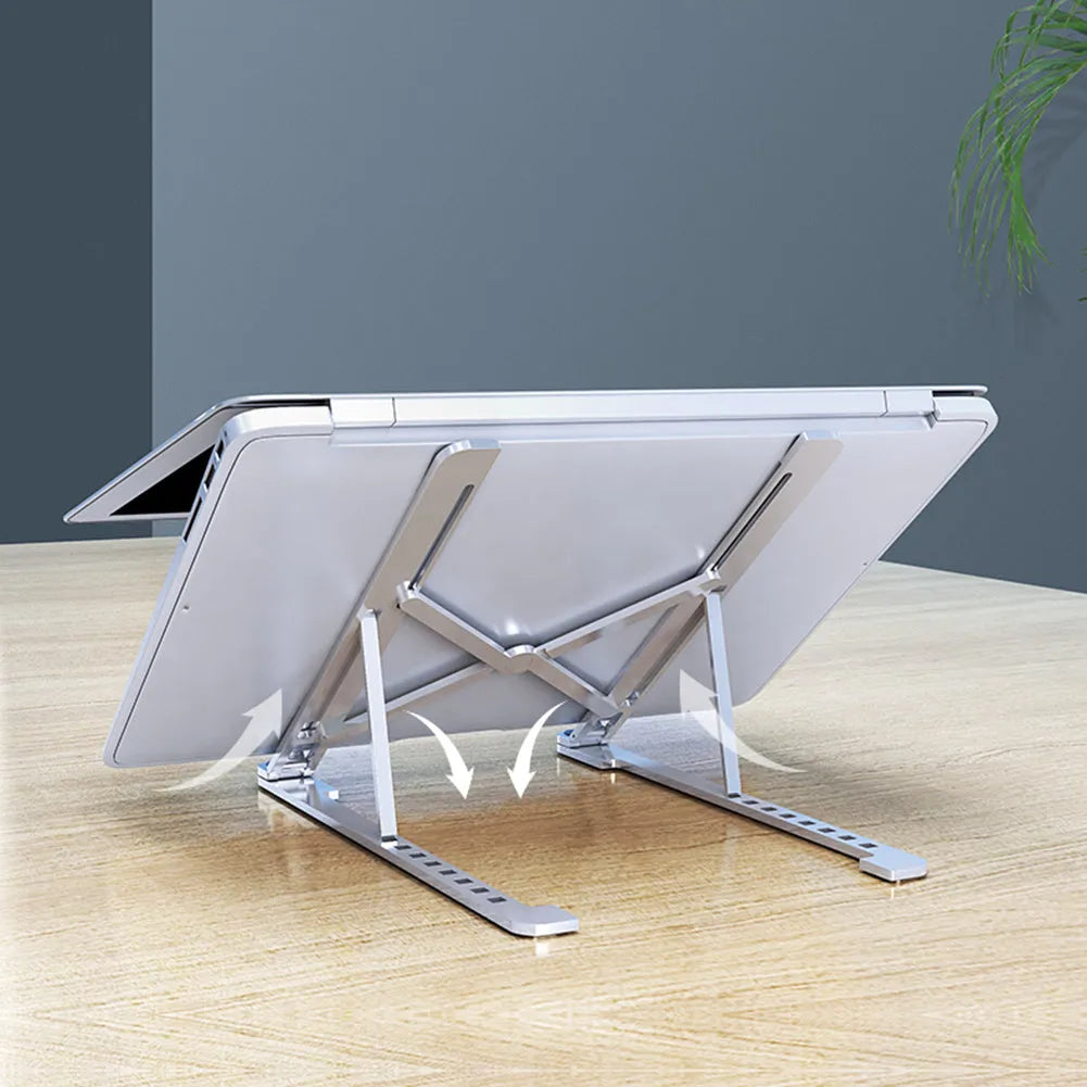 Aluminium foldable laptop stand in silver colour showing adjustable height and compact folded size.