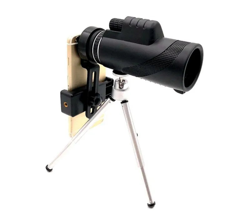Black HD 40x60 monocular telescope with smartphone mount shown on a table.