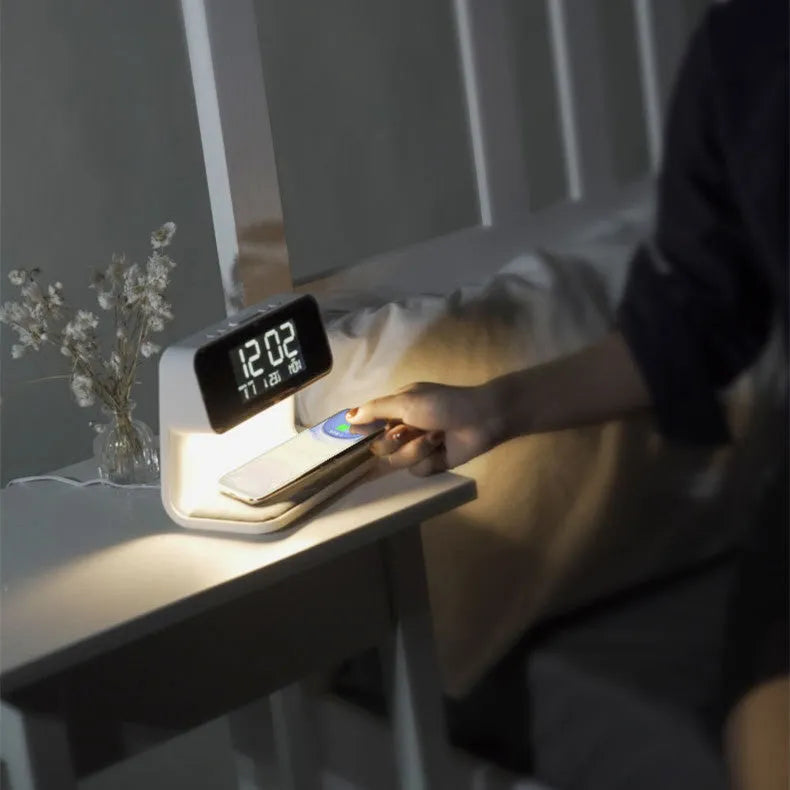 White 3-in-1 bedside lamp with wireless charging pad, LCD display, and ABS lampshade