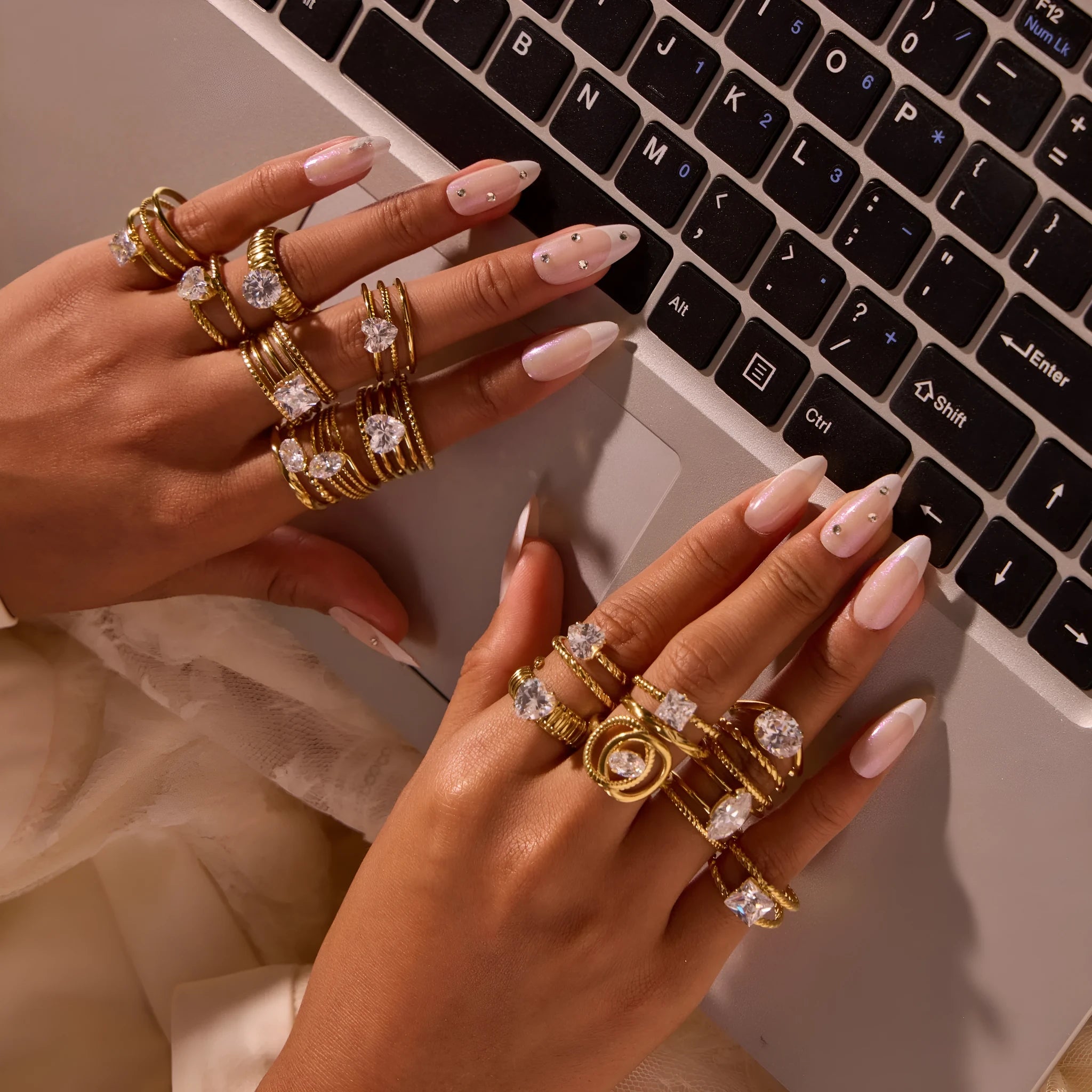 Gold electroplated geometric zircon ring with open mouth design on stainless steel