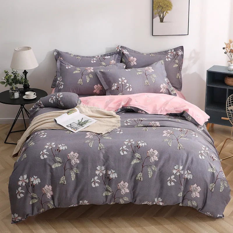 Cotton four-piece bedding set in multiple sizes with quilt cover, fitted sheet, and pillowcases