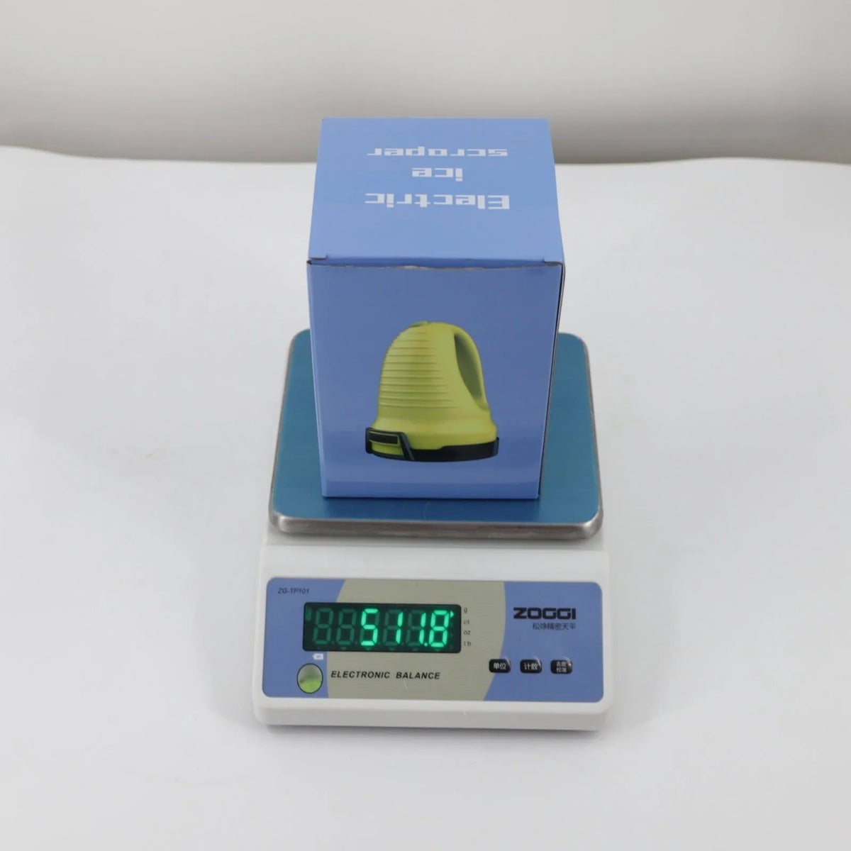 Yellow electric car ice scraper with ABS body, 3000mAh battery, USB charger, protective cap, and rotating removal disc, 16x11x11cm