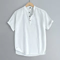Men's solid colour short sleeve T-shirt in thin cotton linen blend fabric on a hanger.