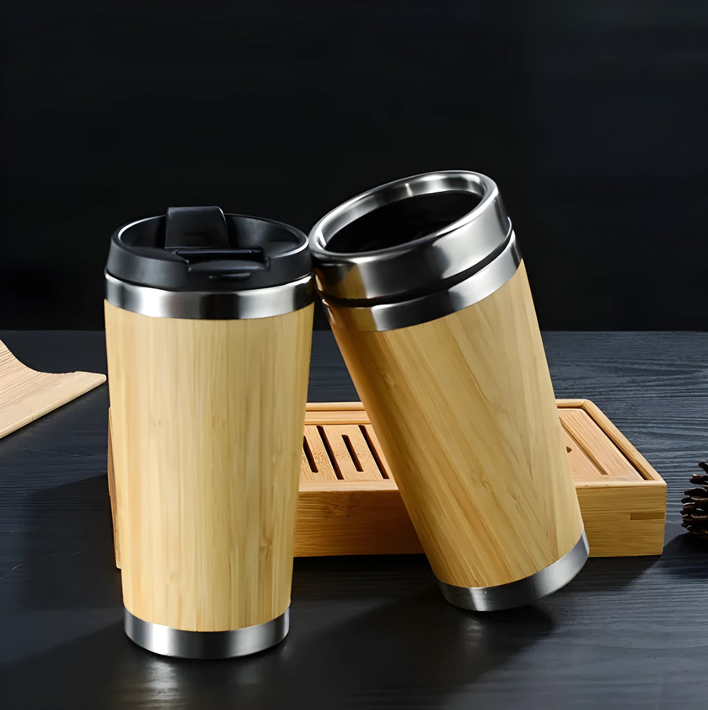 Bamboo insulated travel coffee cup with lid, showing anti-slip base pad, 420ml capacity.