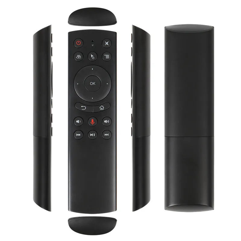 G20 black wireless flying mouse remote with multiple buttons next to its small USB receiver.