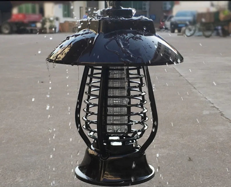 White outdoor solar mosquito lamp with solar panel and LED light beads for garden insect control.