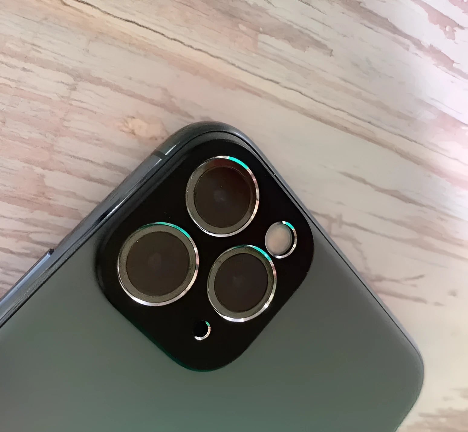 Metal lens protection ring accessory for iPhone 11 and iPhone 11 Pro in various colours.
