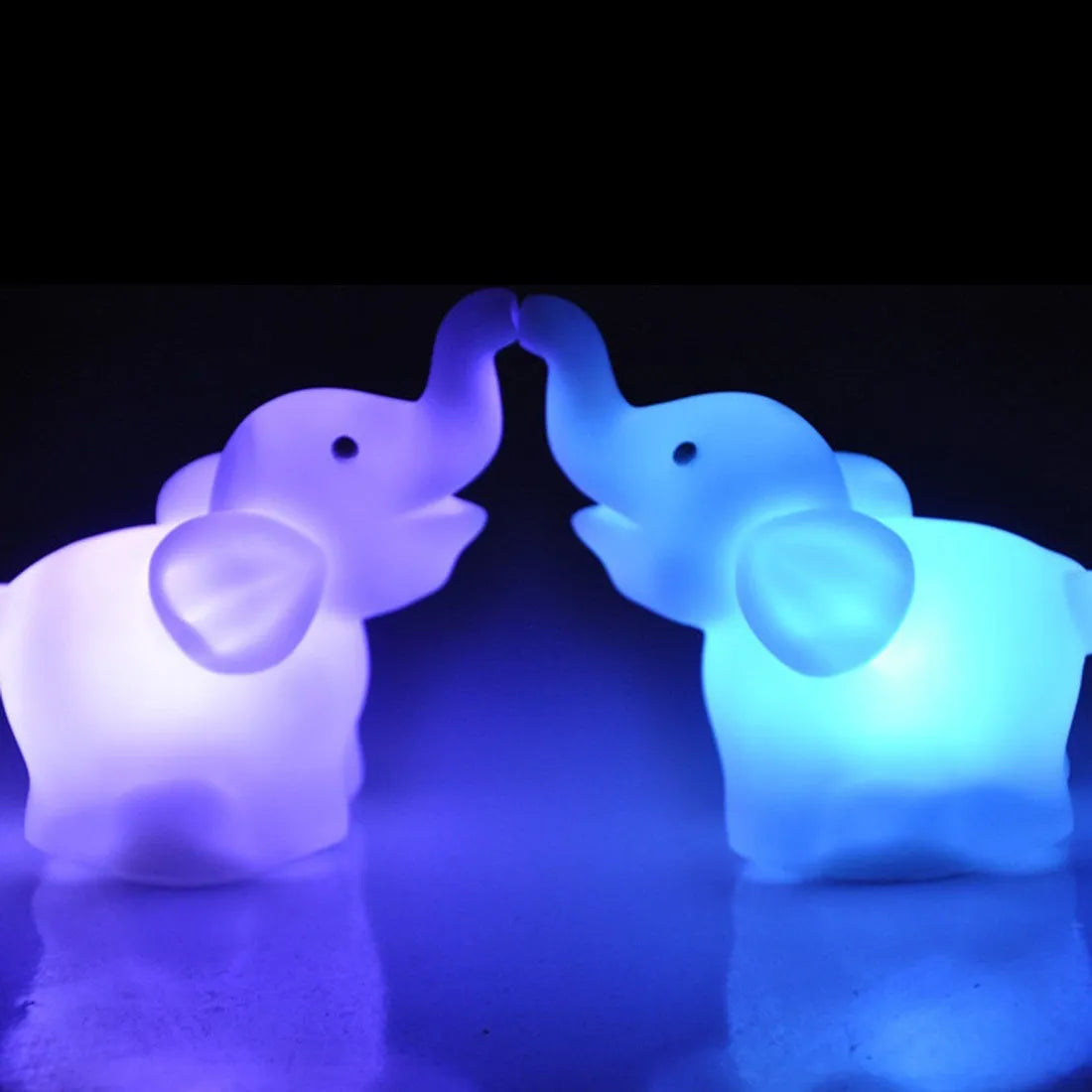Elephant night light, vinyl, 8x8.8x4.5cm, battery operated, 7 colour slow flashing lamp