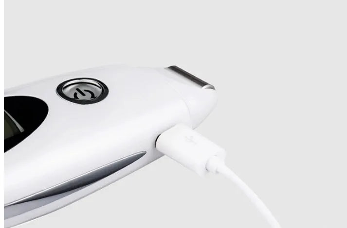 Ultrasonic beauty instrument star silver with adjustable vibration frequency and charging cable