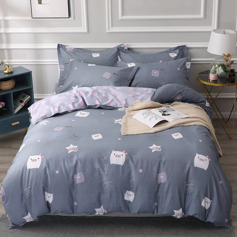 Cotton four-piece bedding set in multiple sizes with quilt cover, fitted sheet, and pillowcases