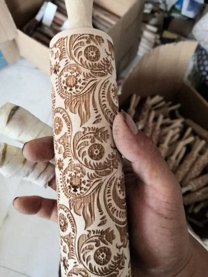 Personalized Christmas rolling pin with a variety of embossed holiday designs, including snowflakes, reindeer, and Merry Christmas patterns