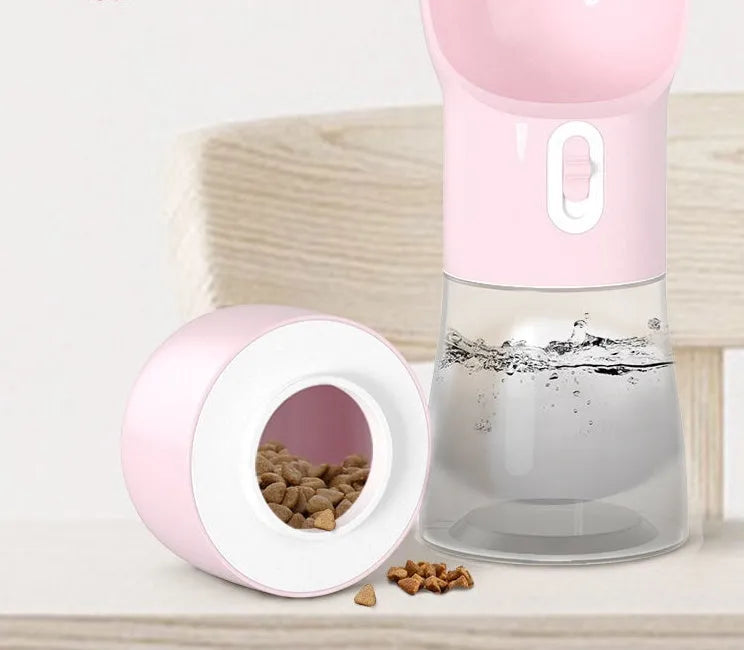 Portable dog water dispenser with 258ml capacity and food container in pink, for outdoor walking and travel
