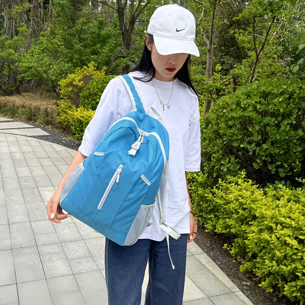 Unisex waterproof hiking backpack in Oxford cloth with curved shoulder straps, available in multiple colours, under 20L capacity.