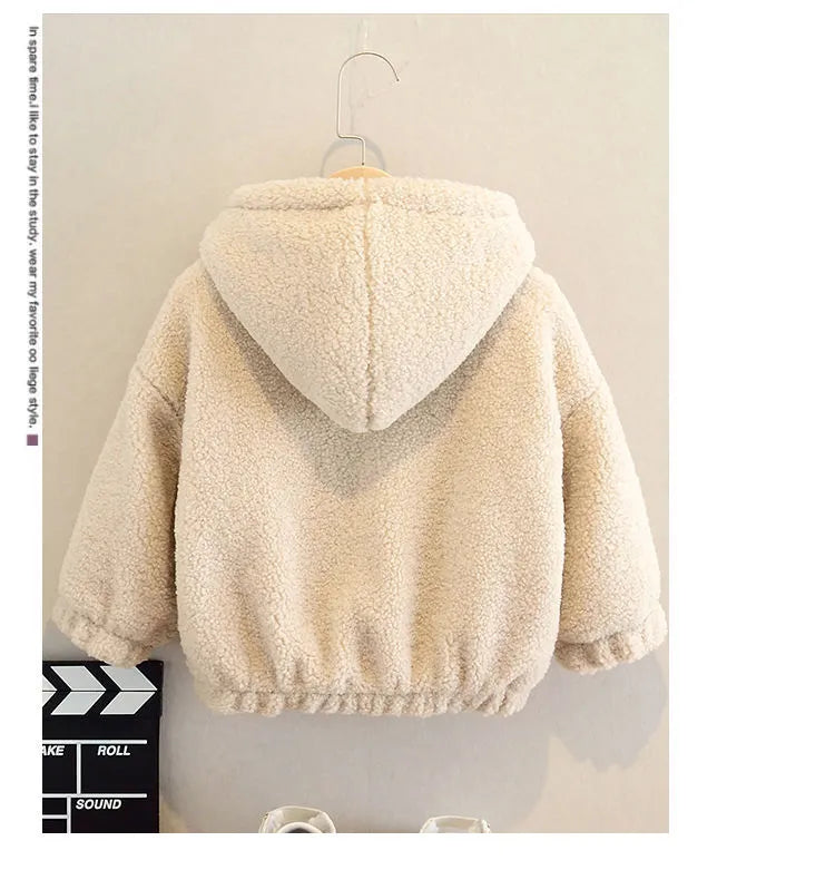 A beige children's fleece jacket with an attached hood, featuring a cartoon pattern and long sleeves.