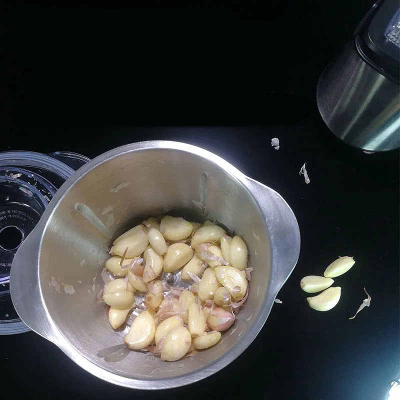 LONG PLUS electric meat grinder and garlic peeler appliance on a kitchen countertop.