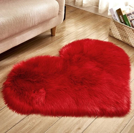 Soft and plush heart-shaped rug in various colors, perfect for cozy home decor