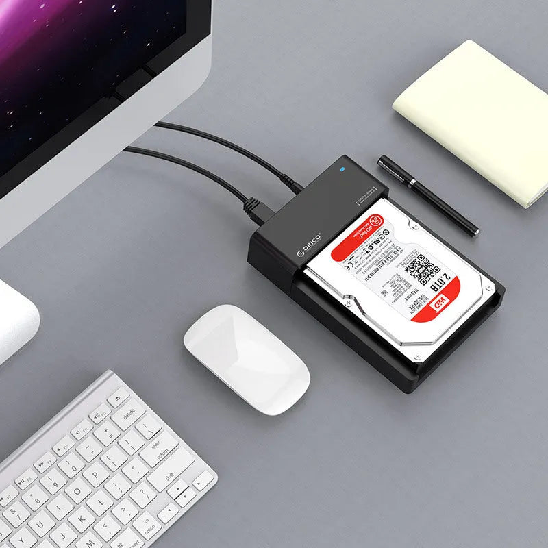 Black plastic 2.5 inch SATA to USB hard drive enclosure with data cable