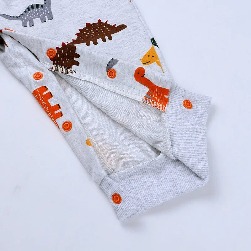 Dinosaur baby bodysuit in grey, blue, or pink with long sleeves, hood, and cotton fabric, Europe and America style