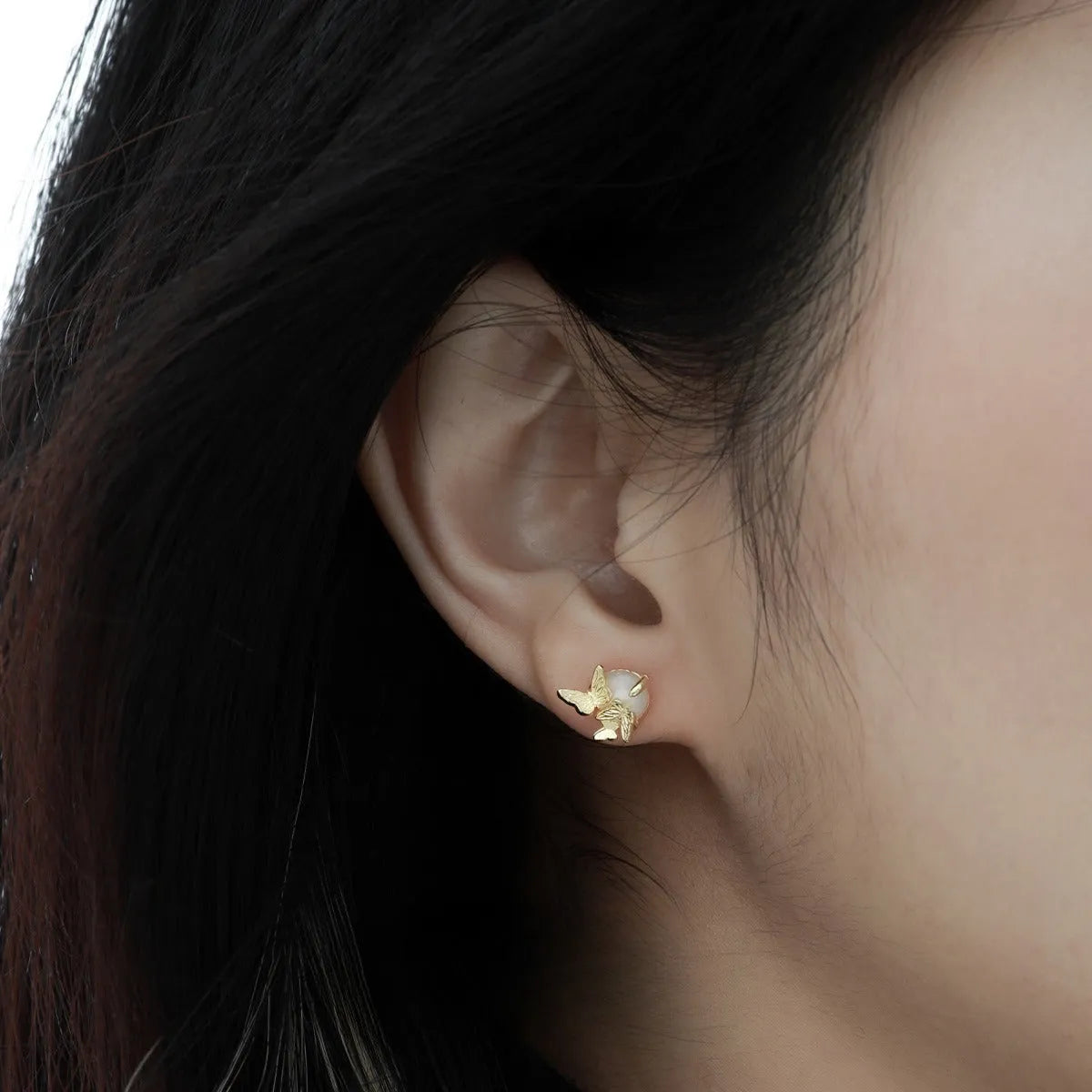 Butterfly ear studs in 925 silver with gold electroplated finish and animal zodiac modelling details