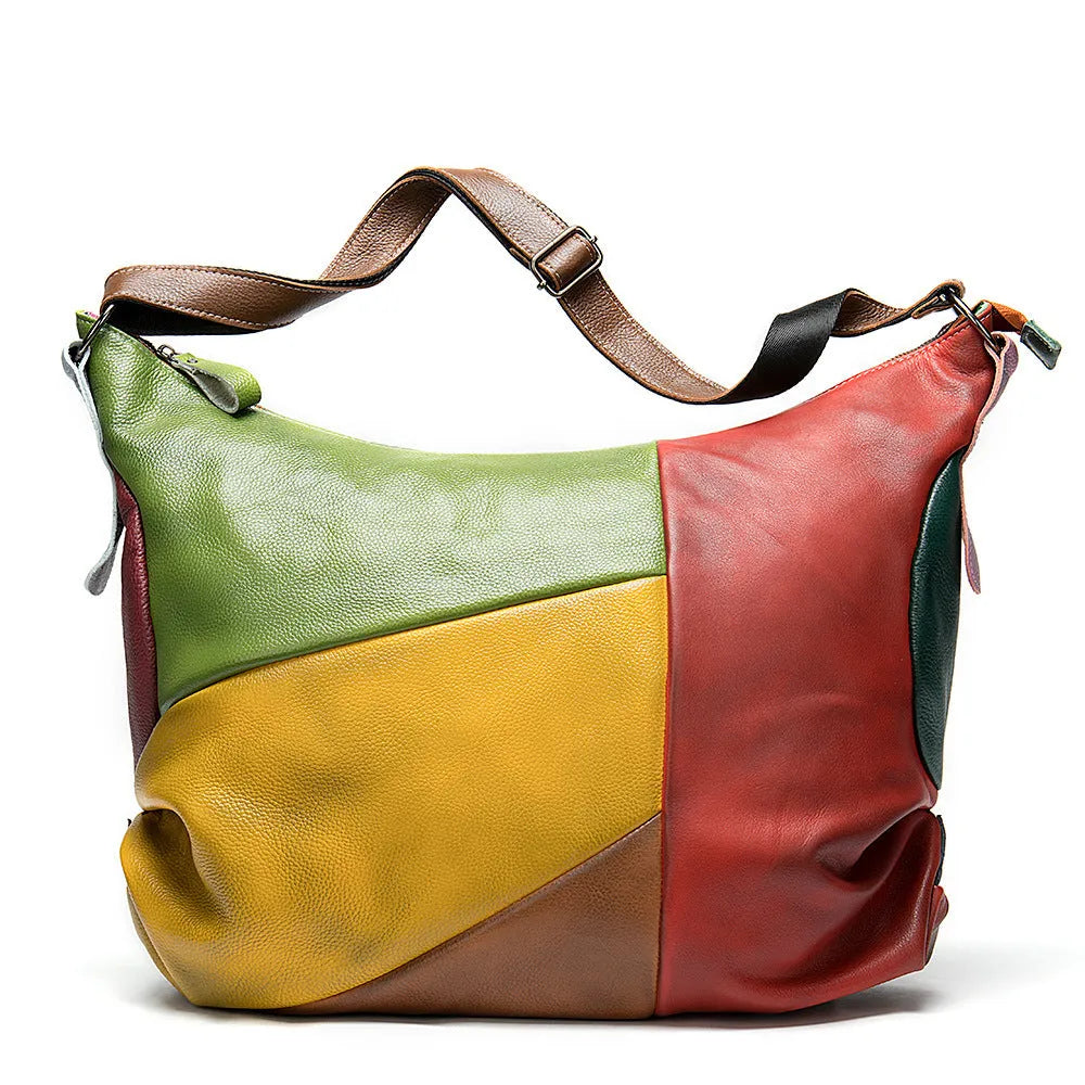 Cowhide leather travel shoulder bag in picture colour, shown with dimensions for laptop and A4 document carry.