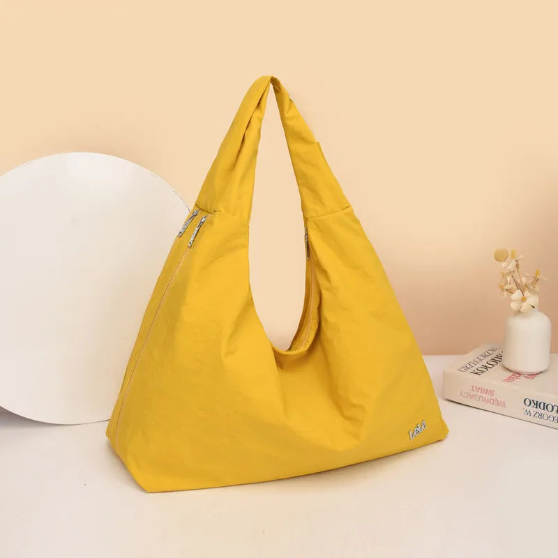 Women's soft nylon heart-shaped underarm shoulder bag in black, yellow, khaki, or blue colour with large capacity