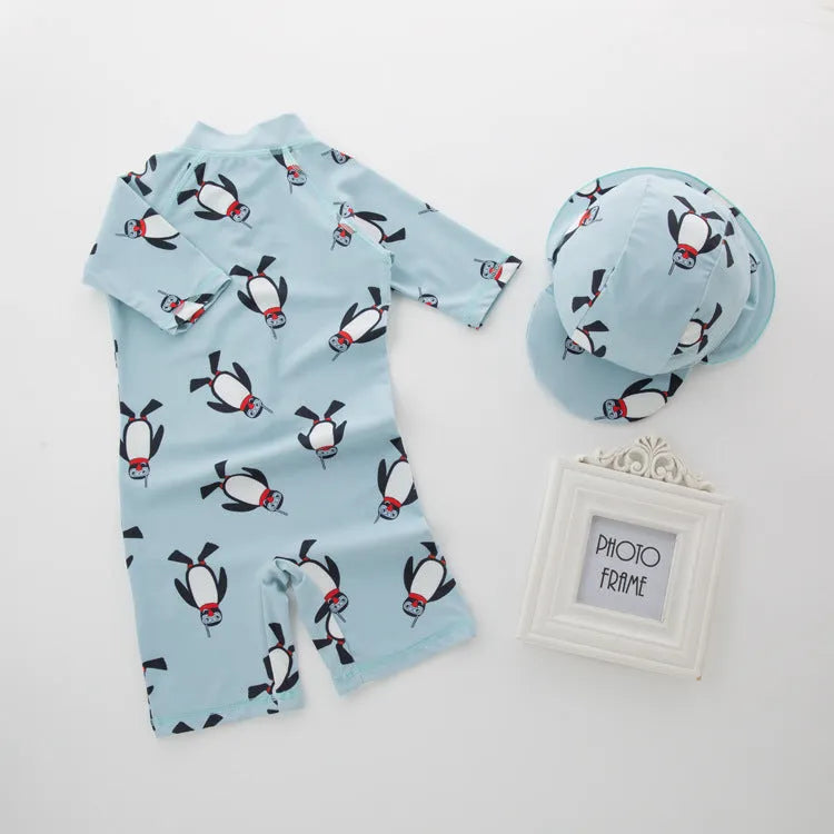 Boy's long sleeve penguin print swimsuit two-piece set with matching swimming cap