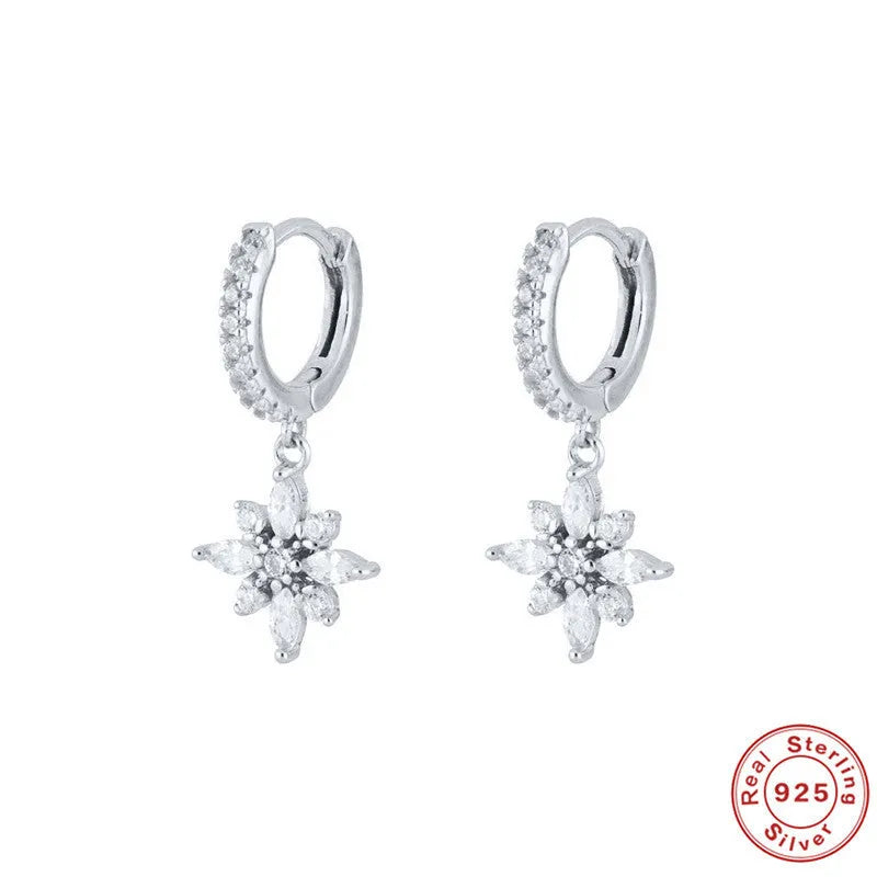 Sterling silver snowflake pendant earrings with geometric design and gemstone accents
