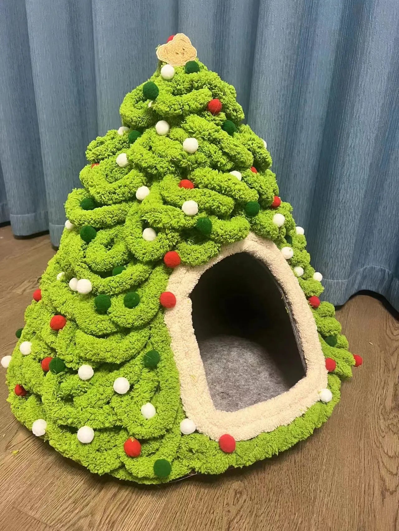 Grey cone-shaped felt cat house with enclosed tent design for indoor cats