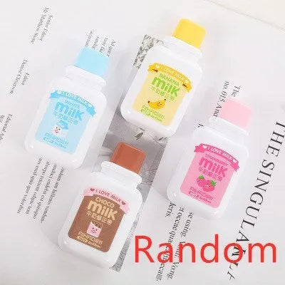 Cute bottle-shaped correction tape dispenser with decorative pattern showing 6m smooth adhesive tape.