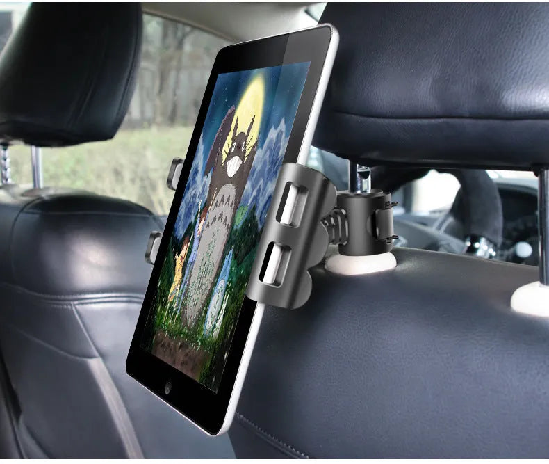 Black universal car headrest holder mounting a tablet for rear seat passenger use