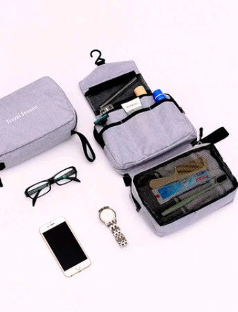 Versatile Travel Organizer: Multifunctional makeup bag with hanging hook, multiple pockets, and foldable design for compact storage