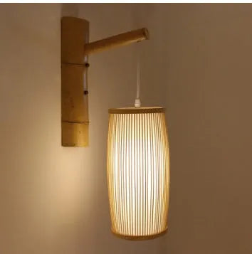 Small woven bamboo pendant lamp with E27 holder, 15cm wide by 35cm high.