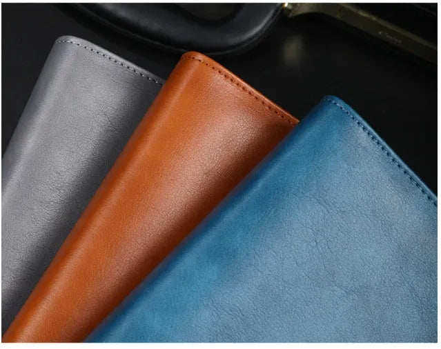 A5 leather notebook with 6-hole binder clip closure and hard cover