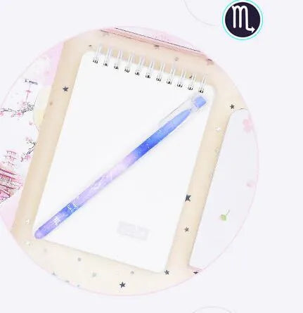 Box containing 12 colourful Constellation quick-drying gel pens for office and writing tasks.