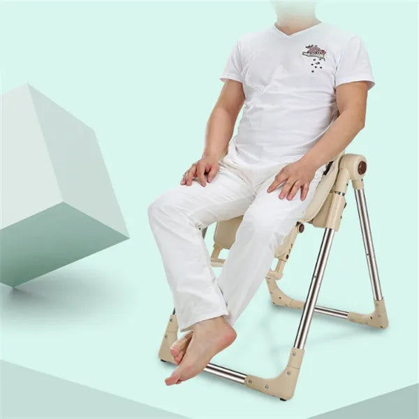 Sky blue portable baby chair for toddlers on a wooden floor.