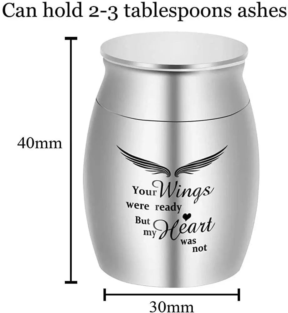 Custom stainless steel pet urn with mirror polish, precision thread seal and colour options in black, gold, photo colour or rose gold.