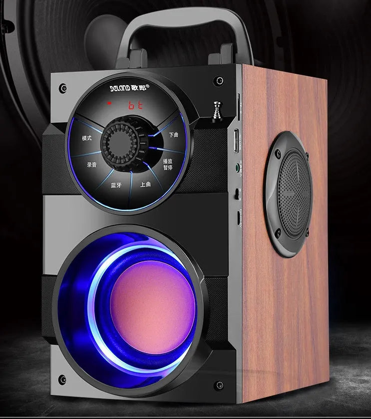 Black portable mini audio system with subwoofer and 3.5mm audio cable.