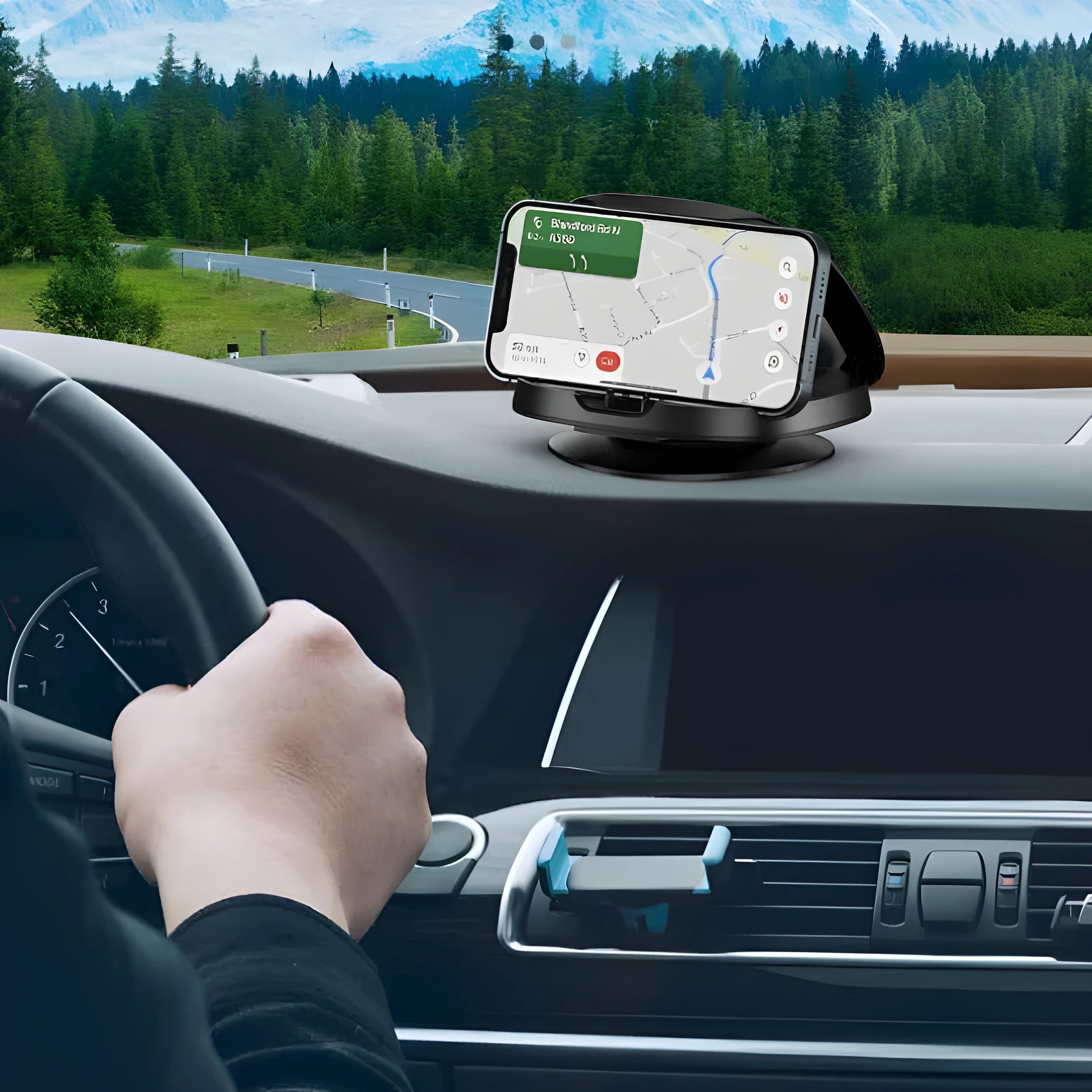 Black rotating car phone mount with suction cup windscreen attachment showing 360-degree adjustment capability