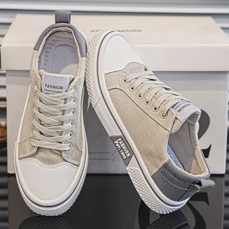 Men's low-top casual canvas shoes in blue colour with round toe and front lace-up design