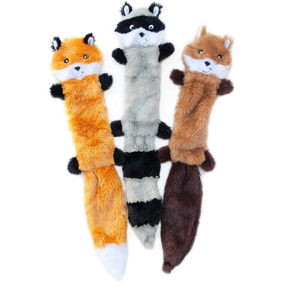 Soft plush dog toy with squeaker in multiple colours including brown, carrot orange, grey, patterned, and yellow options.