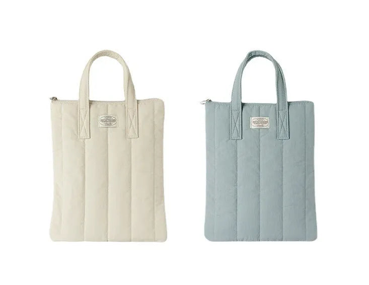 Personalised polyester laptop briefcase in milky white, shown with size options for 11, 13-14, and 15-15.6 inch devices.