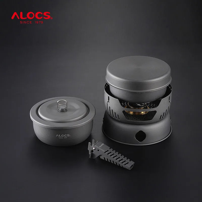Alocs CW-K26 aluminium non-stick outdoor camping pot set stacked on a wooden table.