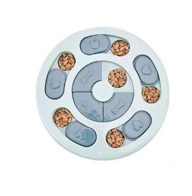 Dog eating interactive stuffy toy slow feed bowl in blue with non-slip base and small food sections
