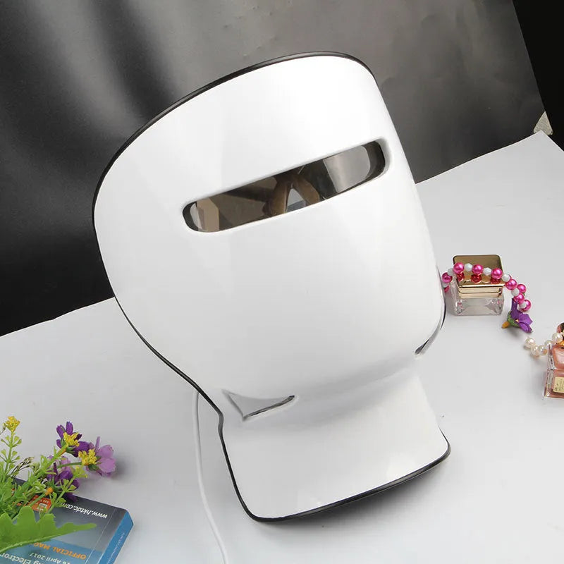 Inverse Age Phototherapy LED facial beauty instrument in white with face and neck mask, controller and power adapter