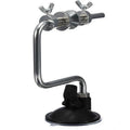Silver aluminium fishing reel winder with adjustable tensioner and suction cup base on smooth surface