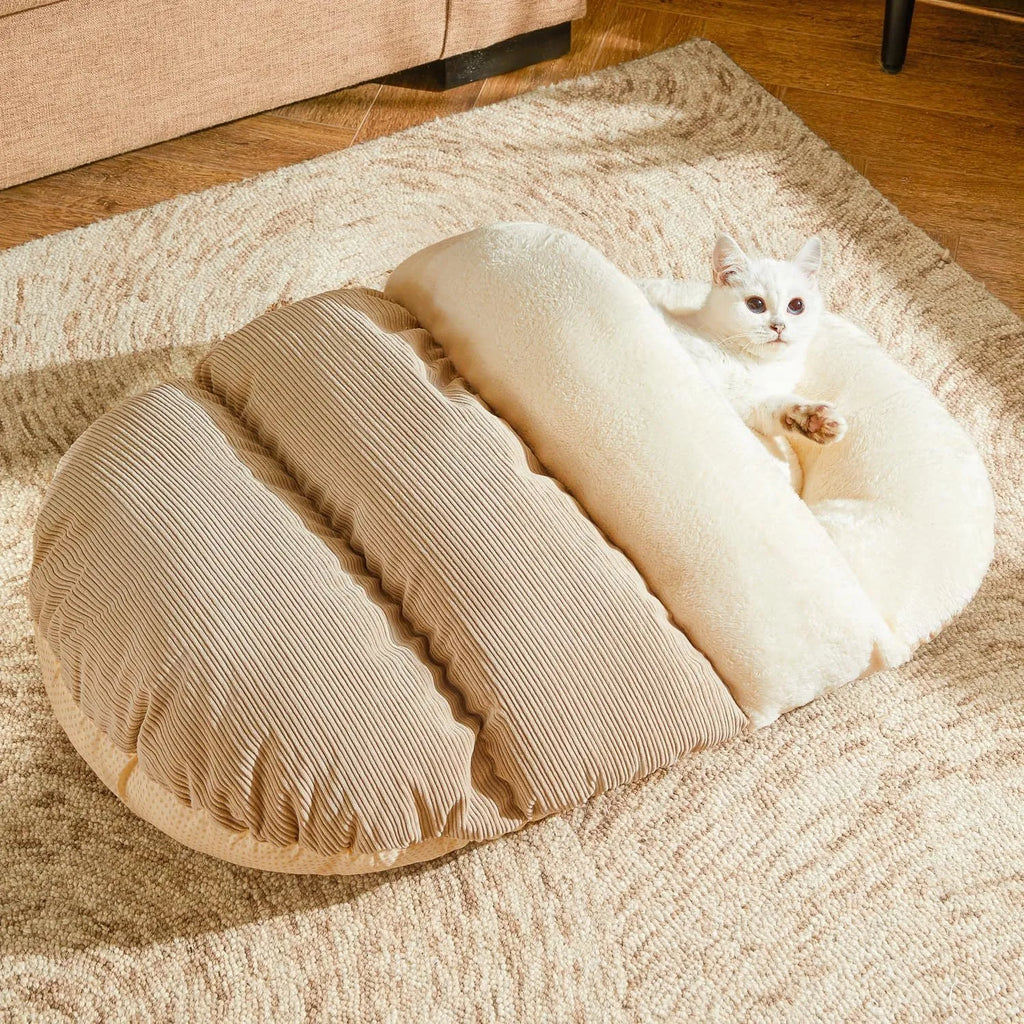 Plush slipper-shaped cat cave bed with corduroy exterior and Arctic velvet lining