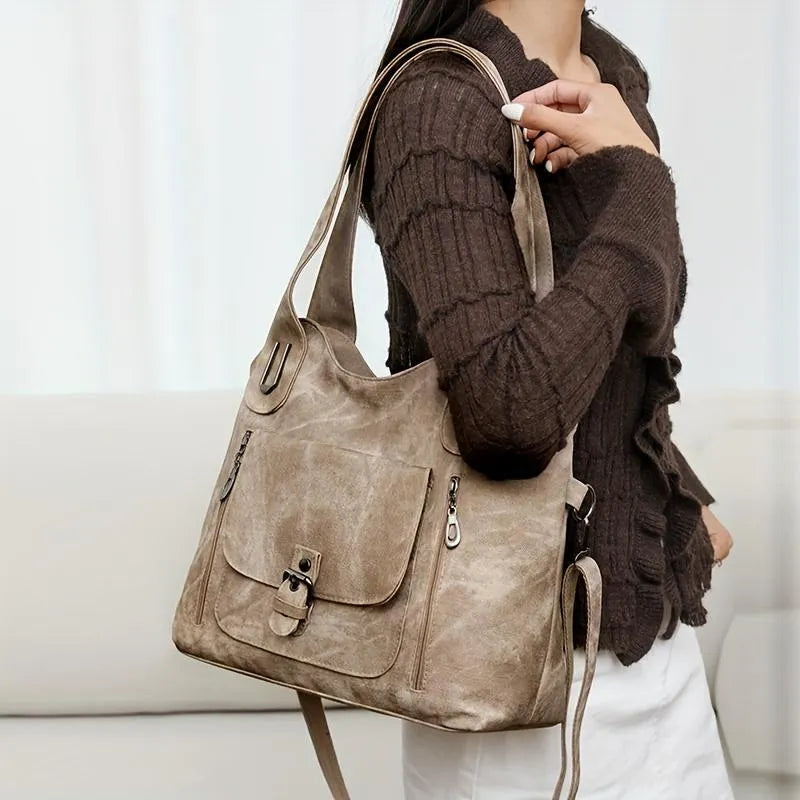 Soft synthetic leather vintage handbag with metal elements, available in blue, brown, khaki, beige, black, gray, and light blue.
