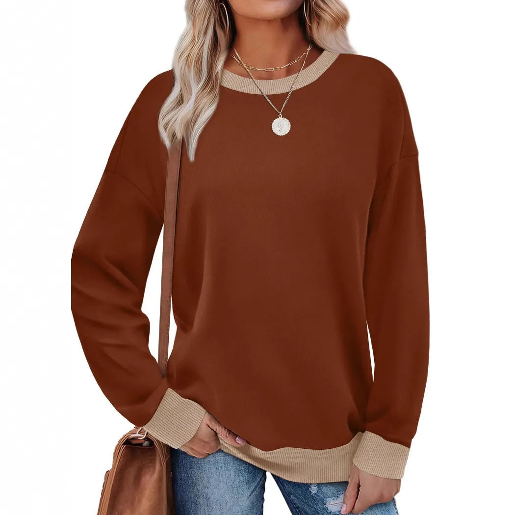 Loose fit striped long sleeve top for women in apricot colour, showing round neck and long sleeves.