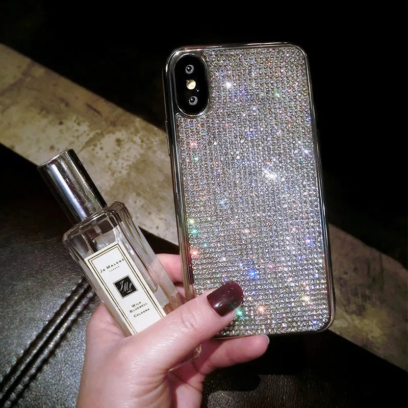 Silver silicone diamond-encrusted phone case for various iPhone models.