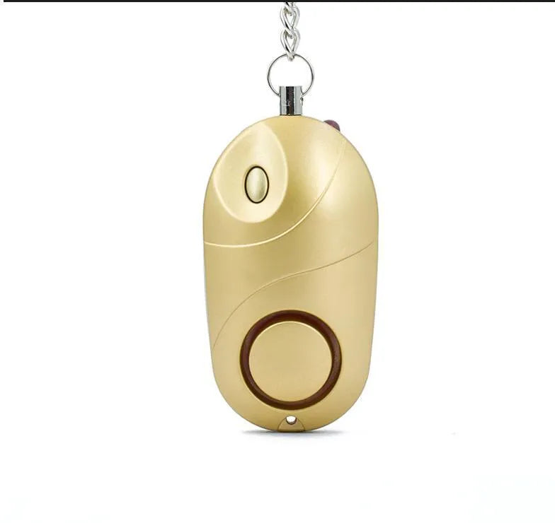 High decibel personal alarm pager keyring with 130dB siren, LED flashlight, and lanyard activation in black.